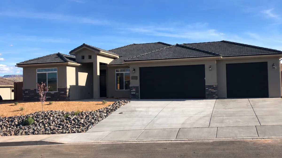 Completed desert residence with three-car garage and finished exterior
